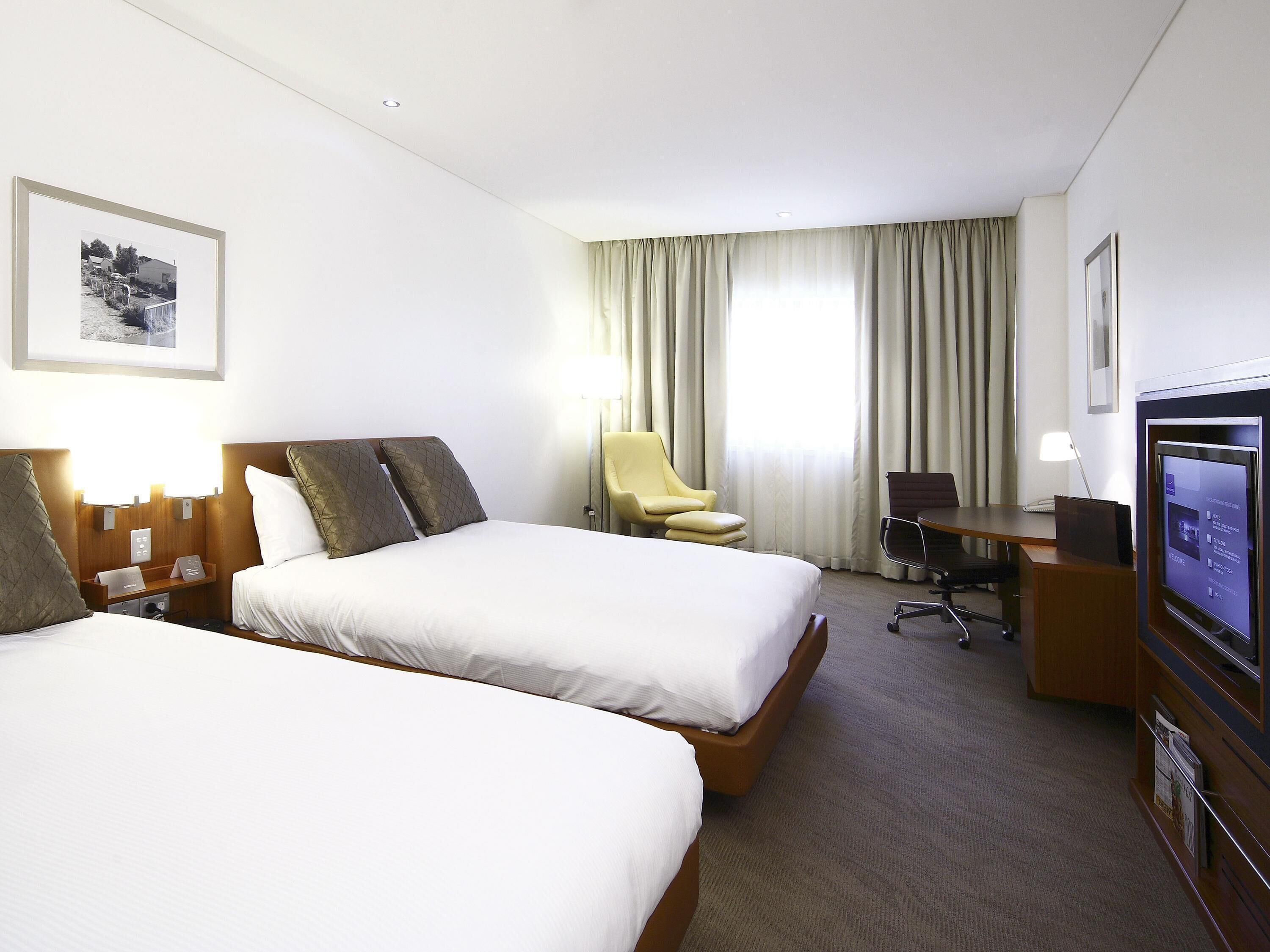 Standard Room, 2 Double Beds | In-room safe, individually furnished, desk, laptop workspace