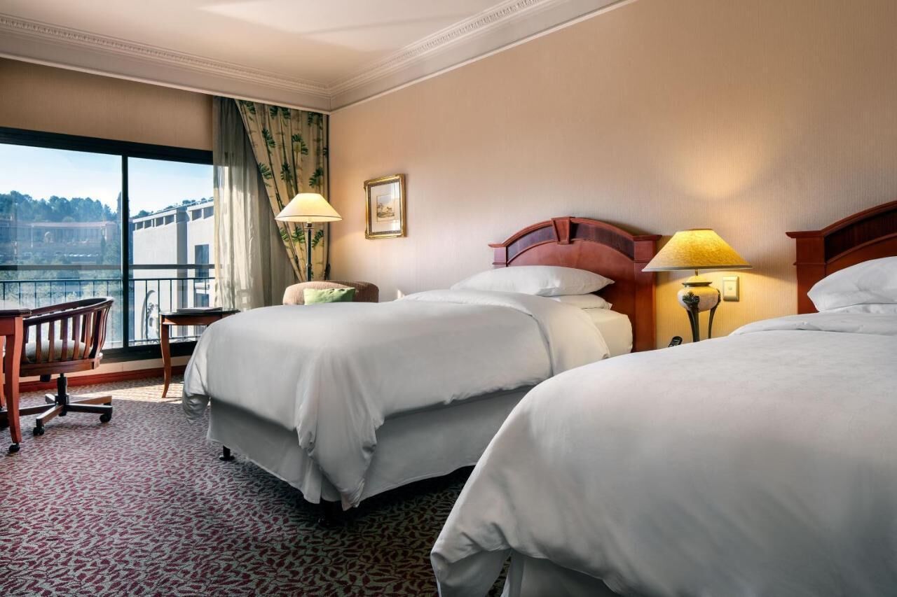 基础客房 | 高档床上用品、羽绒被、迷你吧、客房内保险箱