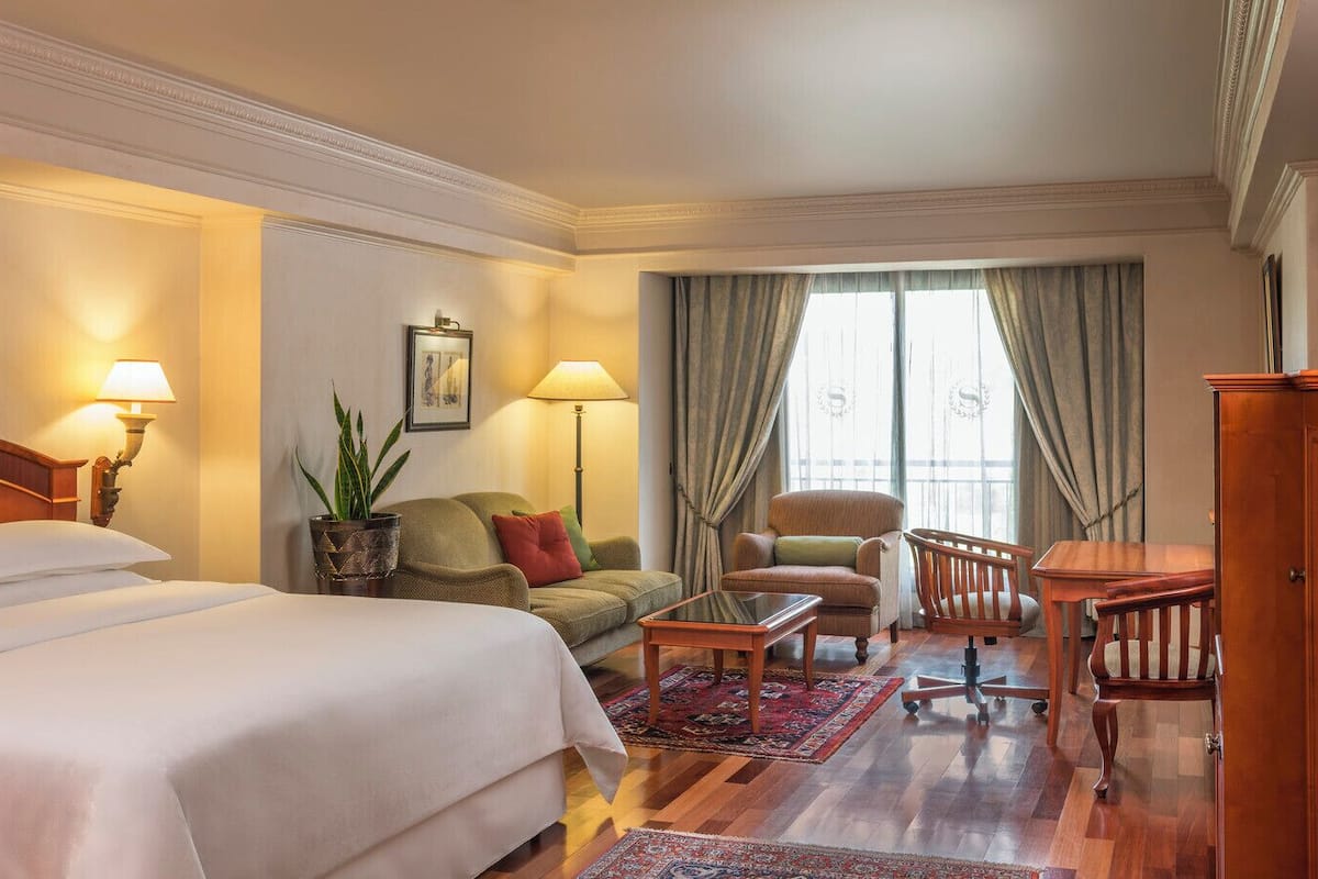 Habitación Deluxe | Ropa de cama de alta calidad, edredón y minibar