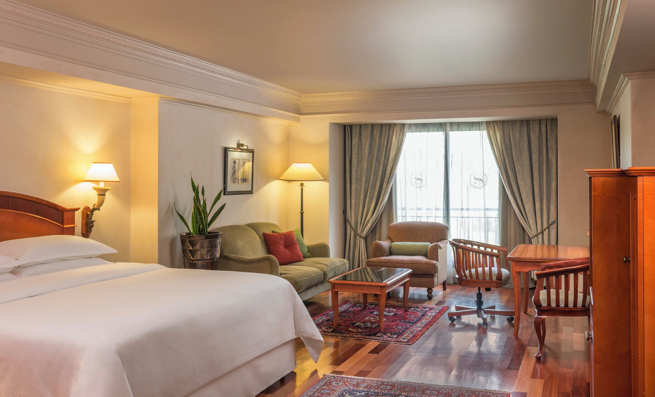 Premium bedding, down comforters, minibar, in-room safe