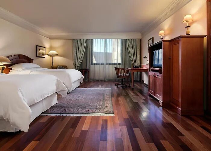 Premium bedding, down comforters, minibar, in-room safe