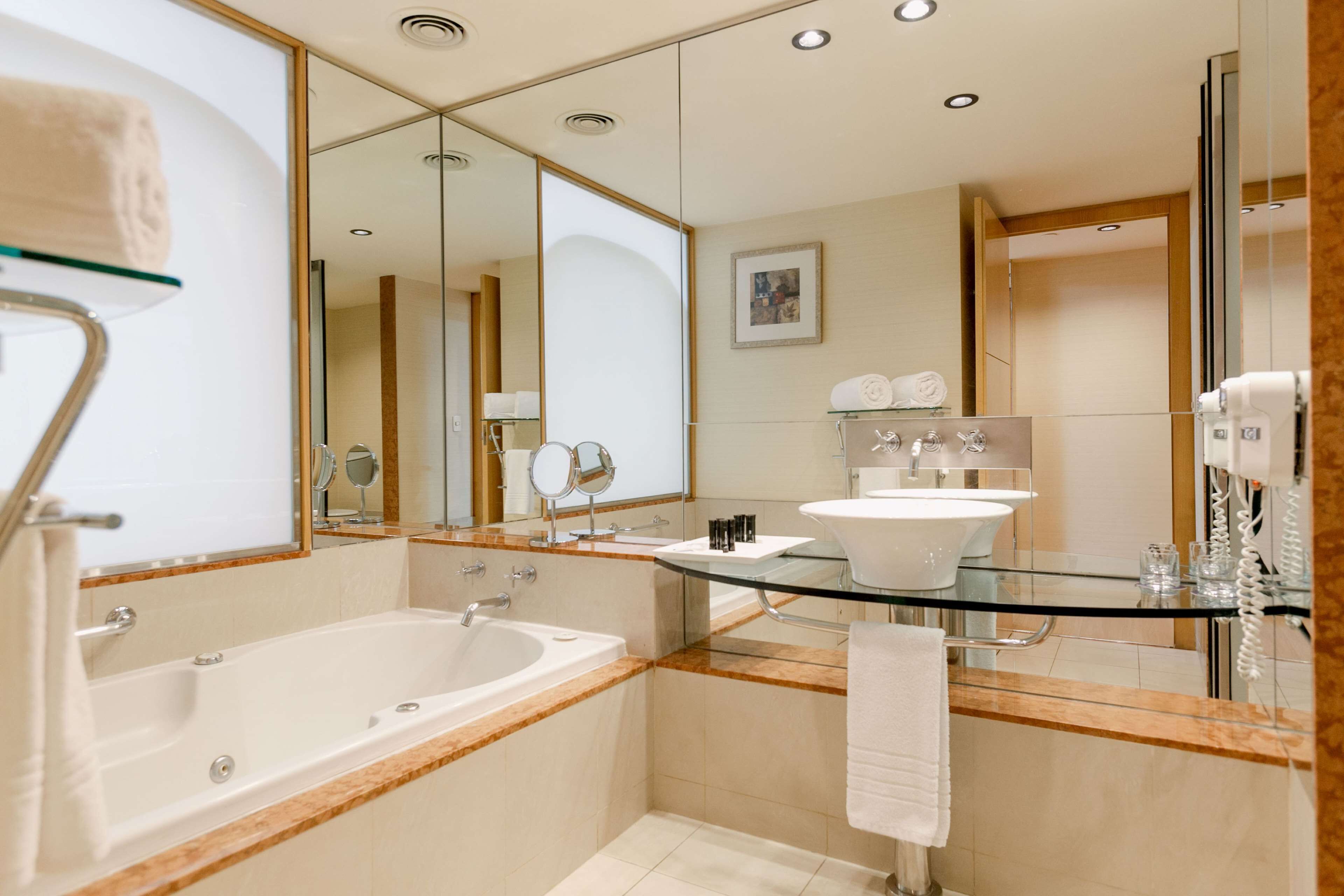 hypo-allergenic bedding, down duvets, minibar, in-room safe