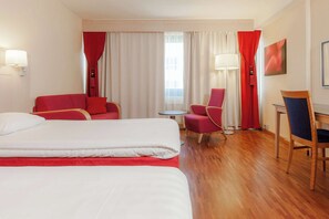 Desk, blackout curtains, free WiFi, bed sheets