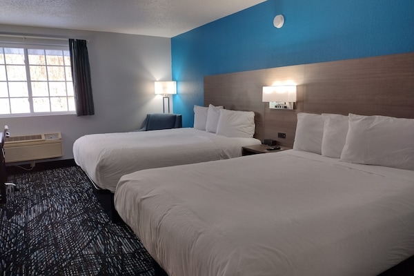Ropa de cama de alta calidad, colchones con pillow-top y escritorio