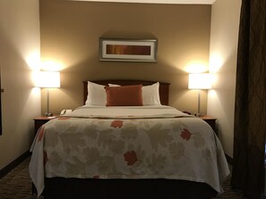 Pillow-top beds, desk, blackout curtains, iron/ironing board