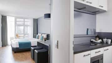 Superior Plus Room, 1 Queen Bed | Minibar, desk, laptop workspace, blackout drapes