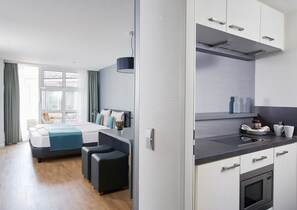 Superior Plus Room, 1 Queen Bed | Minibar, desk, laptop workspace, blackout drapes