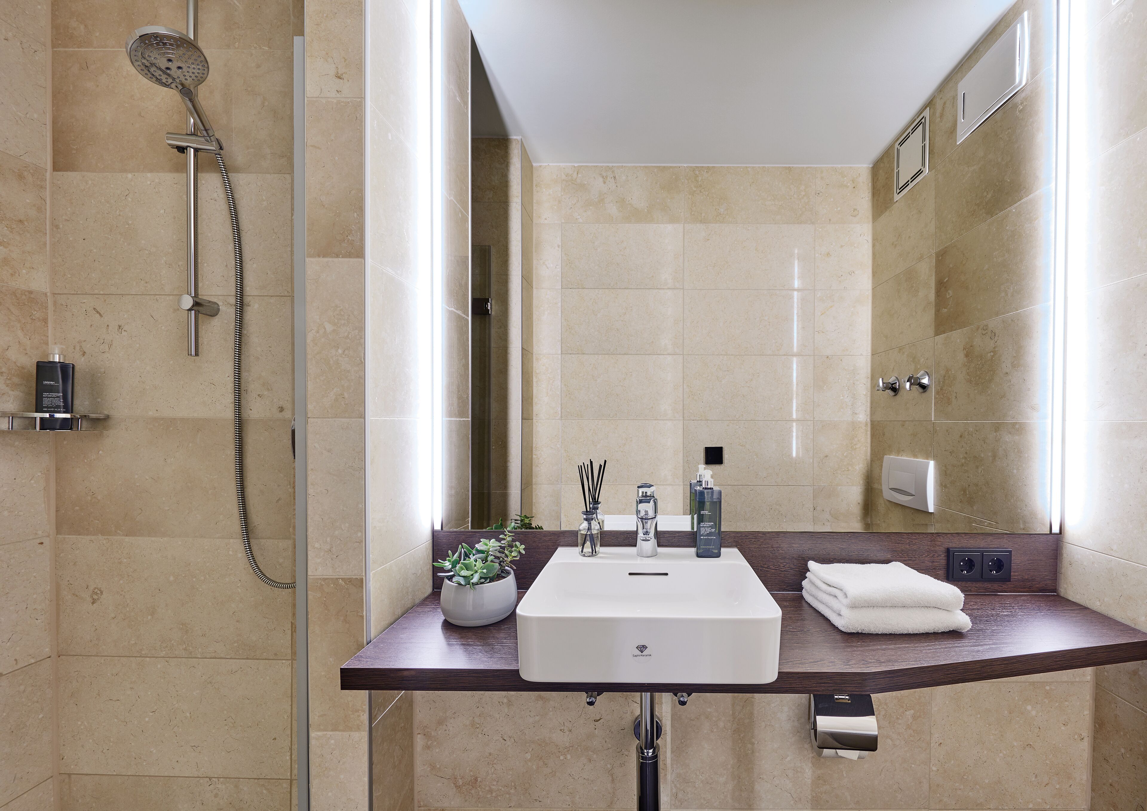 shower, eco-friendly toiletries, hair dryer, towels