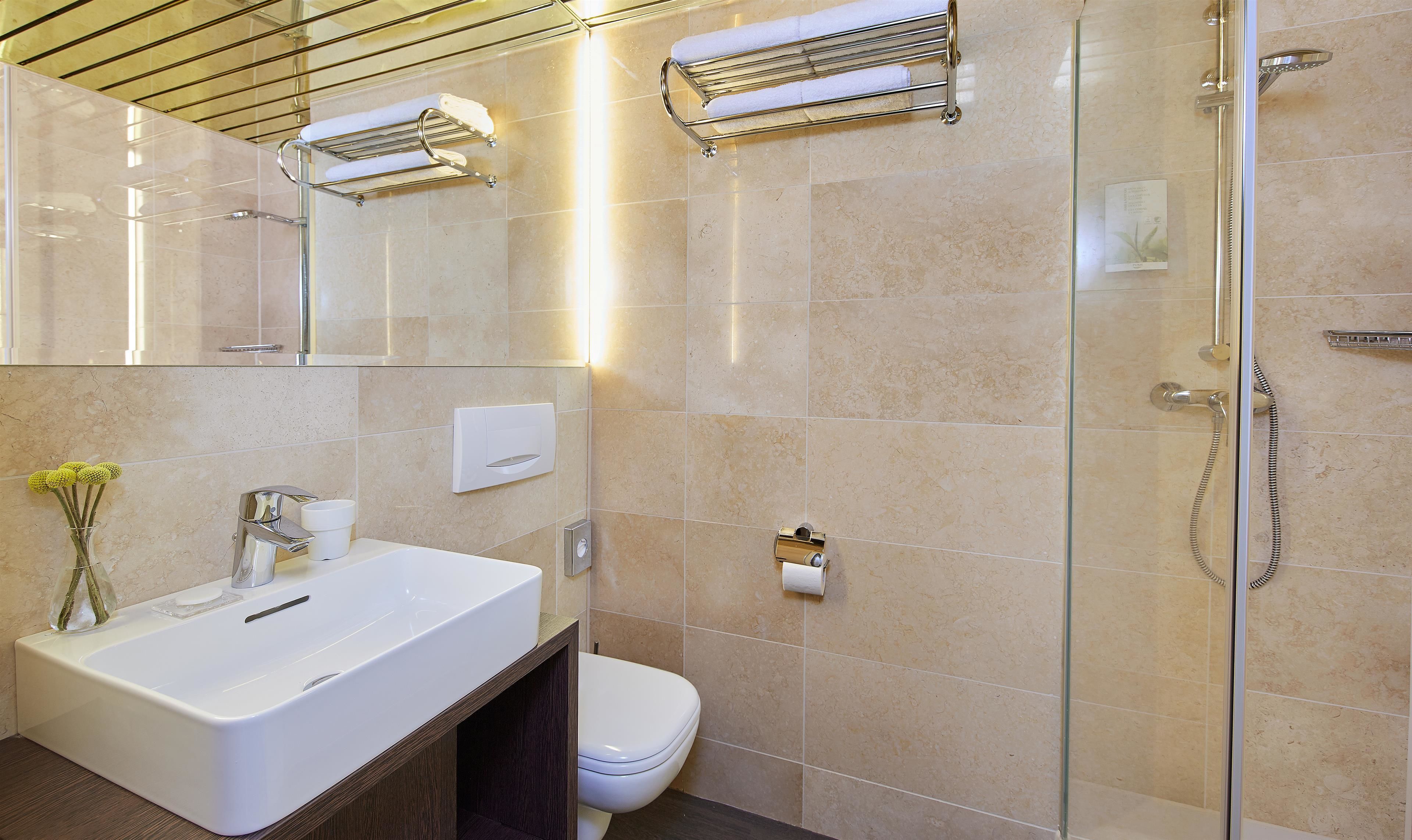 shower, eco-friendly toiletries, hair dryer, towels