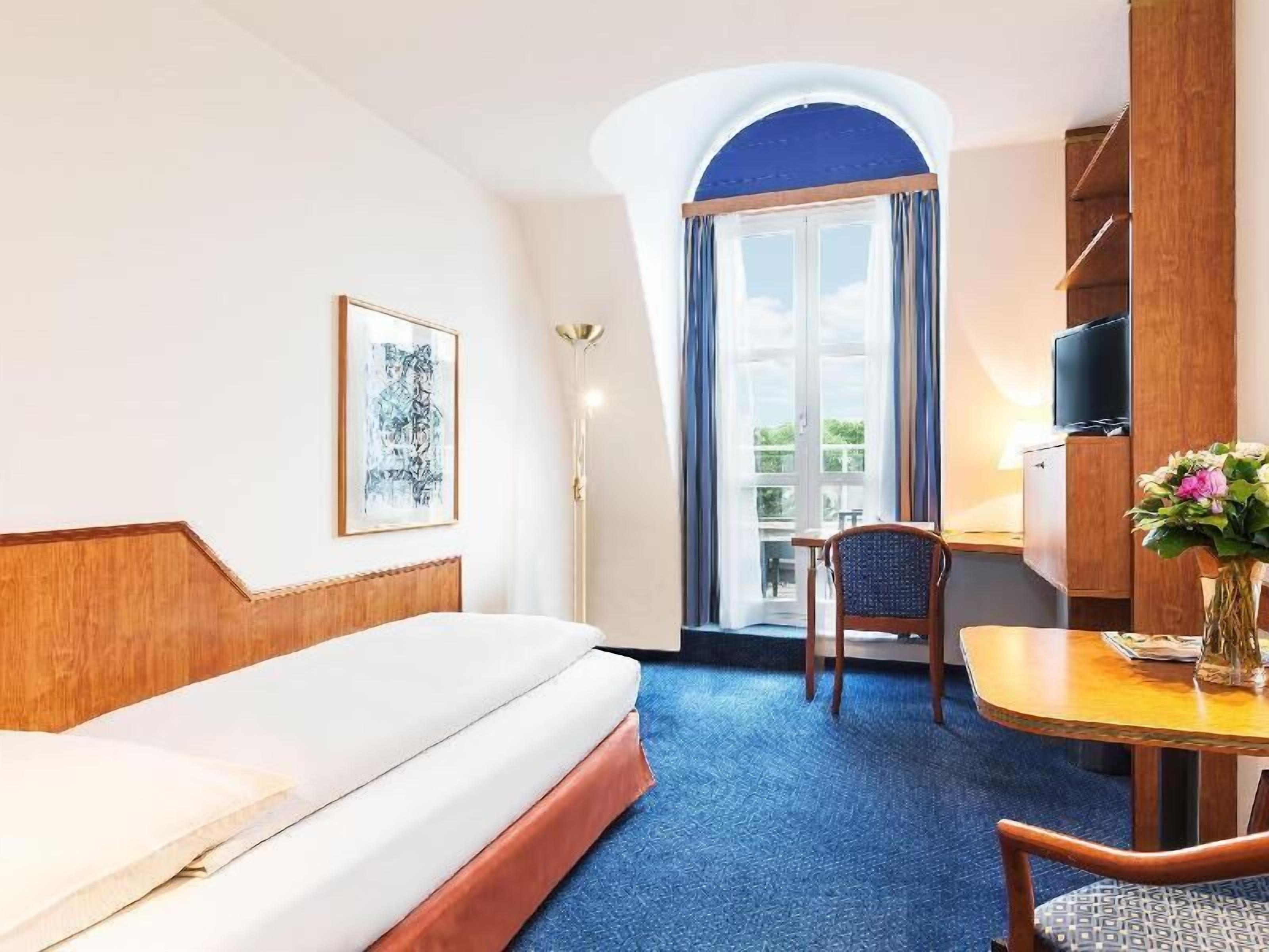 Premium bedding, down duvets, in-room safe, desk