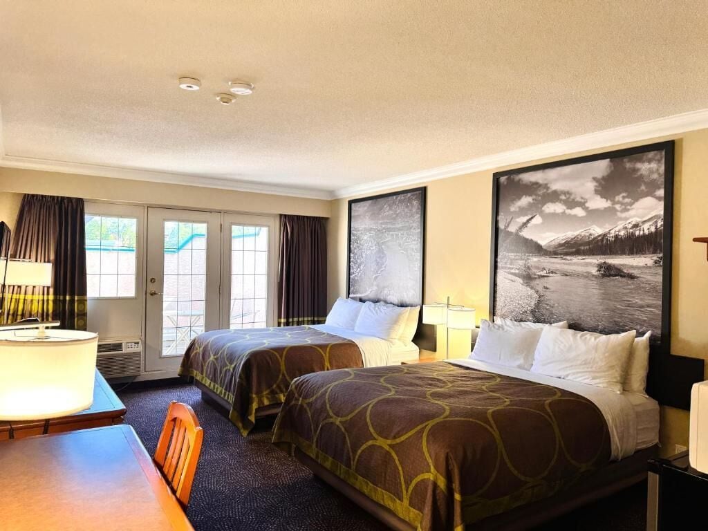 Desk, blackout drapes, iron/ironing board, free cribs/infant beds