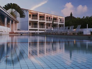 Outdoor pool, pool umbrellas, sun loungers