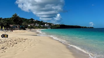 Beach nearby, white sand, sun-loungers, beach towels