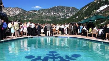 Relax by the pool with a breathtaking view of the surrounding mountains.