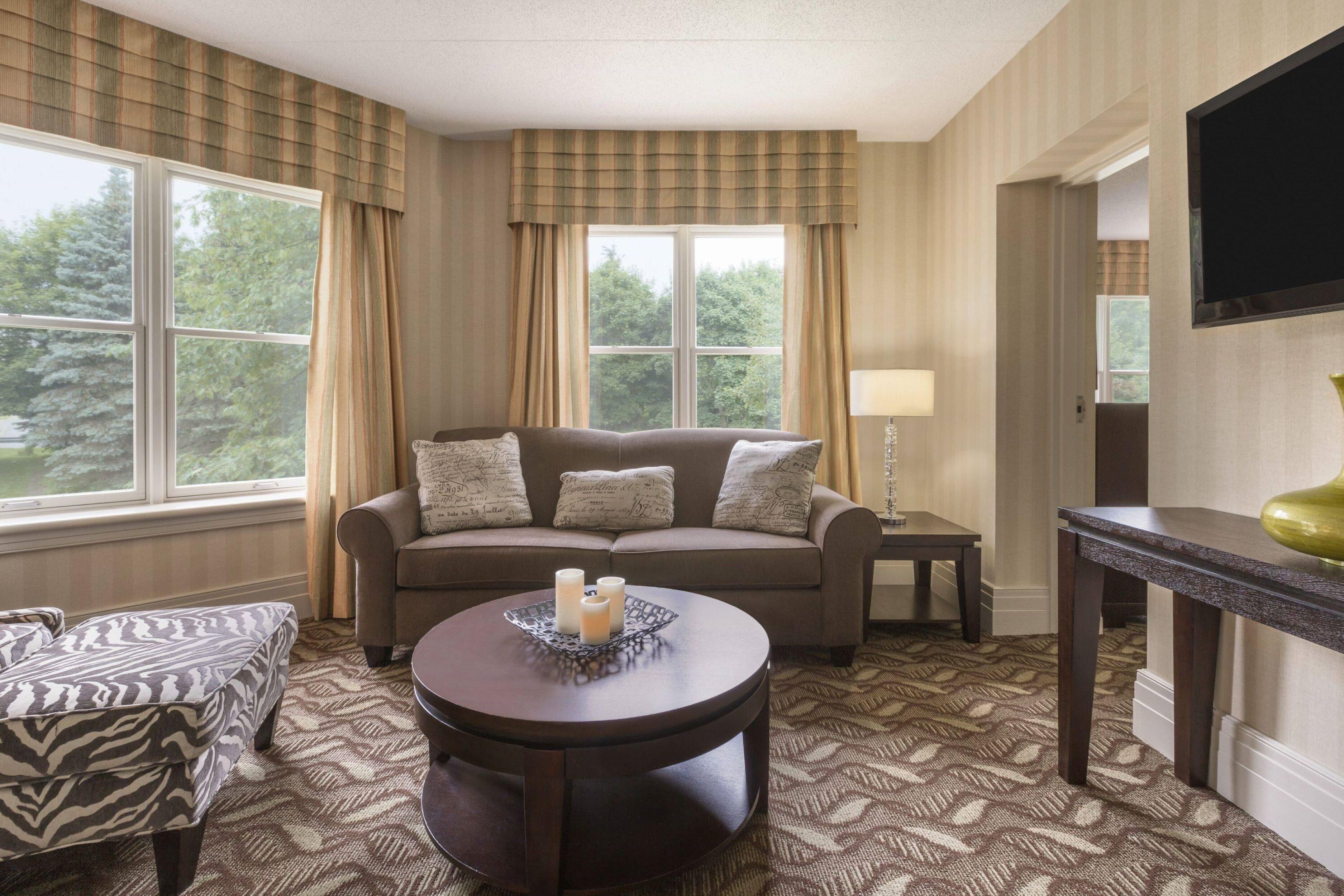 Desk, laptop workspace, blackout drapes, iron/ironing board