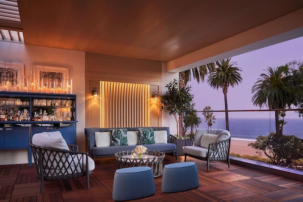 Rooftop bar, ocean views, open daily