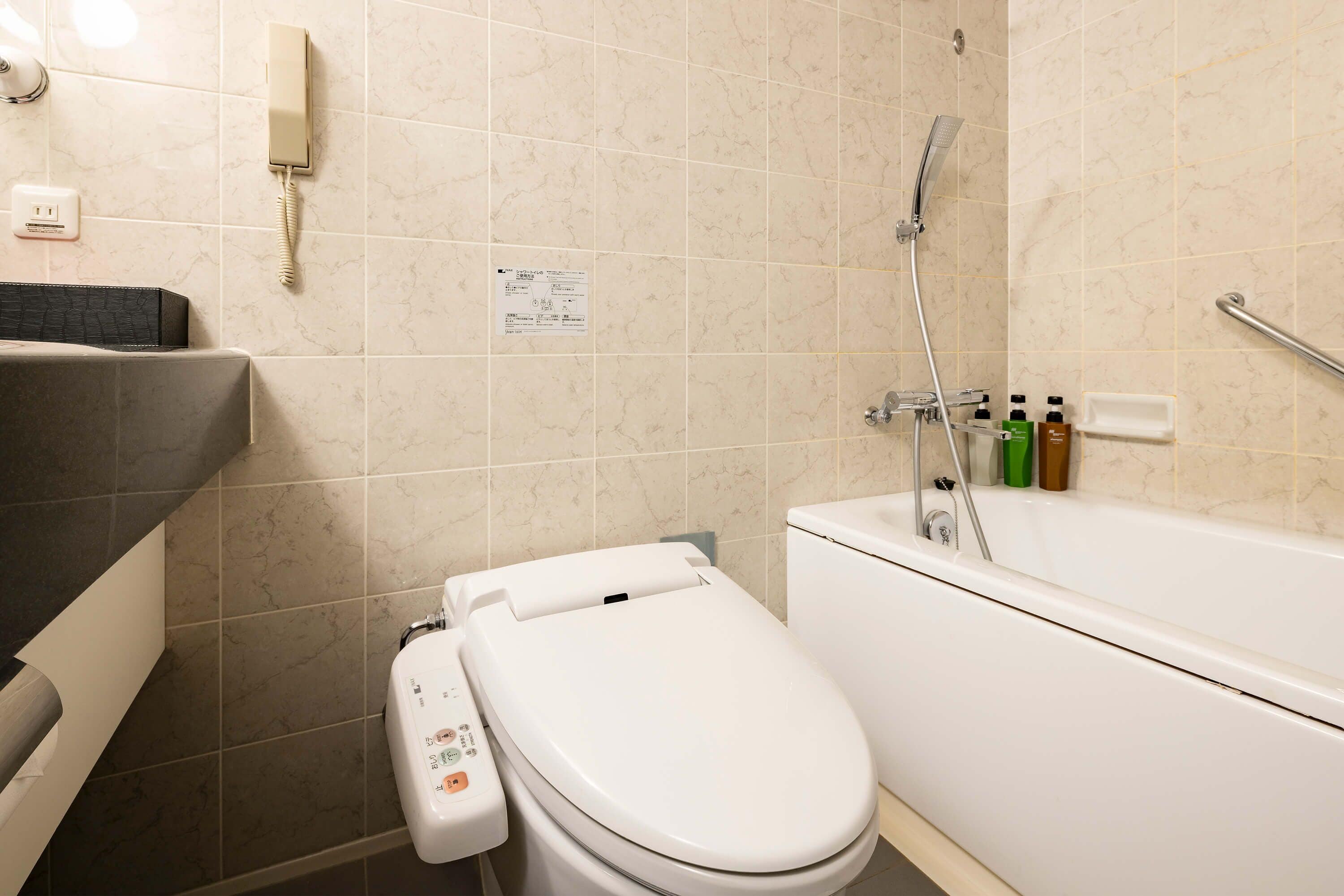 combined shower/bathtub, deep-soaking bathtub, free toiletries