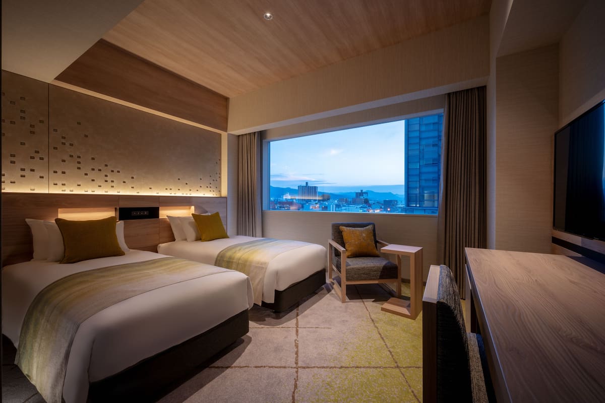 South Tower Twin Room, Non Smoking | Down duvets, in-room safe, individually decorated