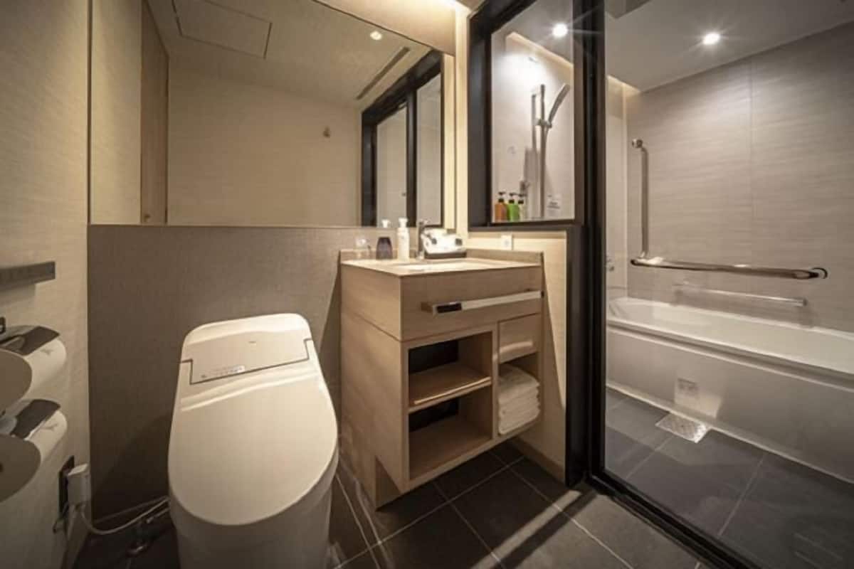 Bathroom | Free toiletries, hair dryer, slippers, electronic bidet
