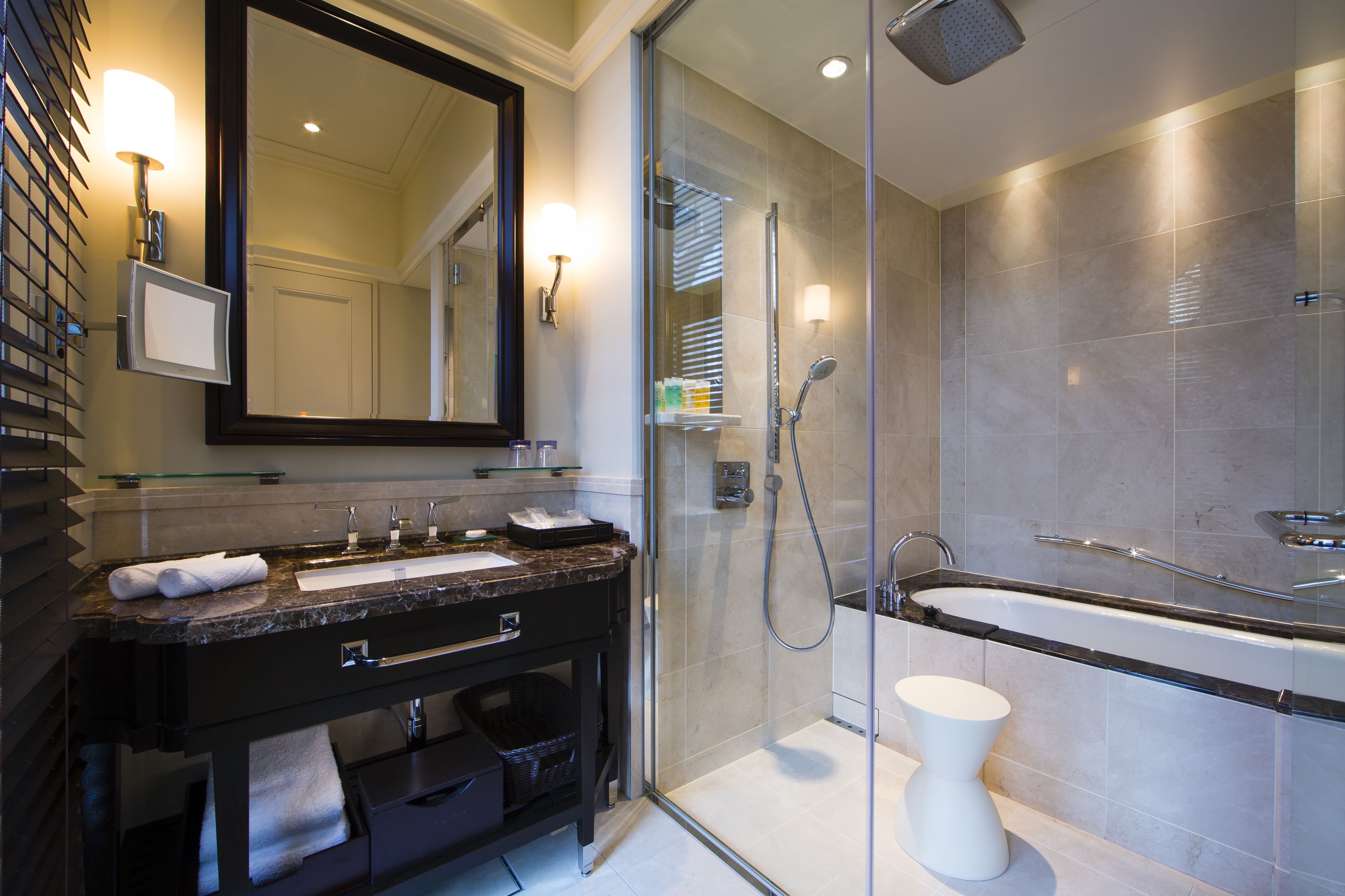 combined shower/bathtub, free toiletries, hair dryer, slippers