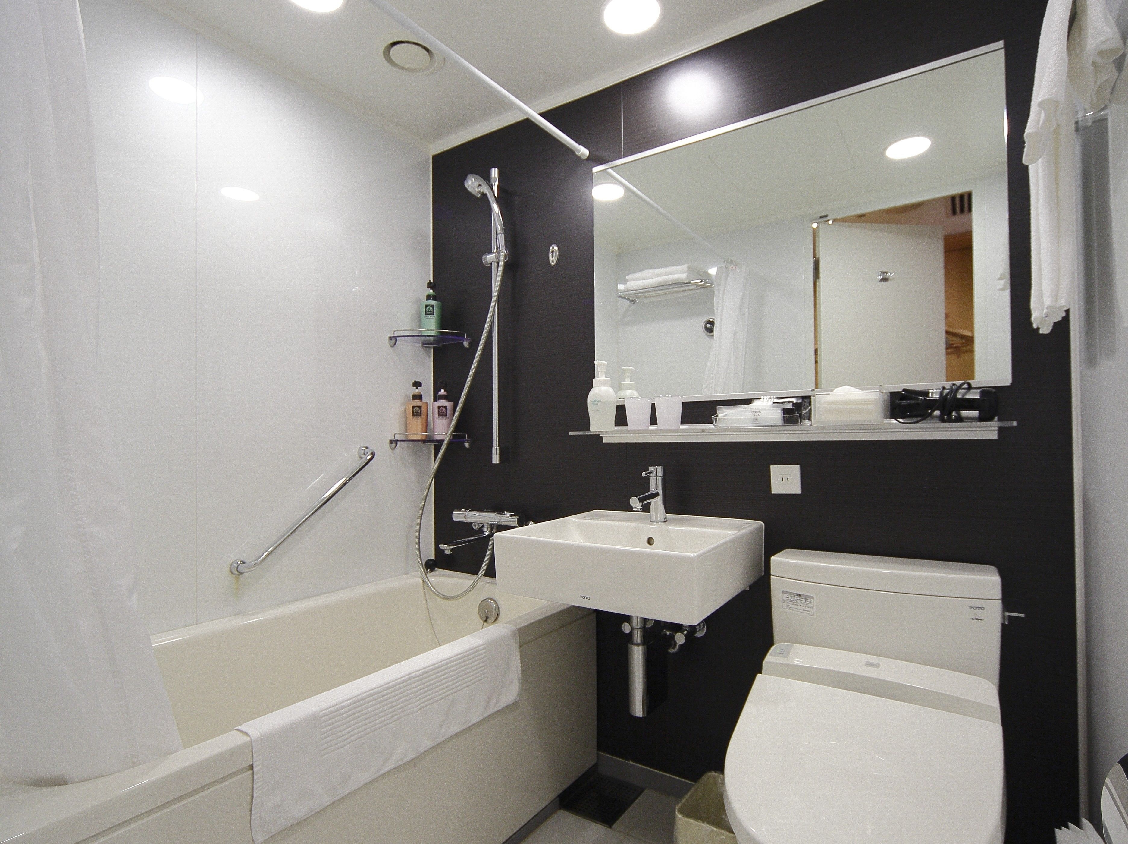 combined shower/bathtub, deep-soaking bathtub, designer toiletries