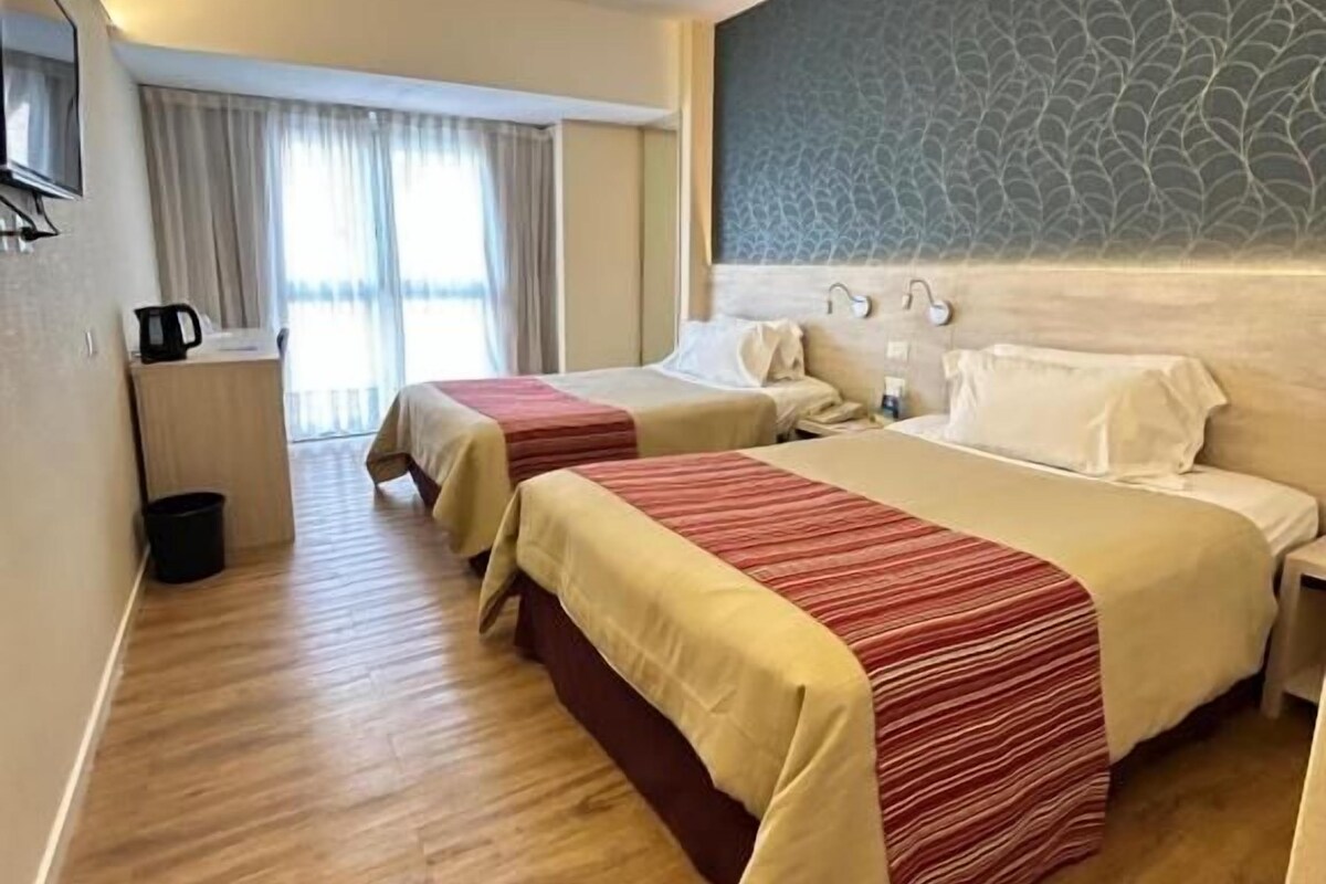 Premium bedding, down comforters, minibar, in-room safe