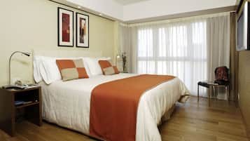 Premium bedding, down comforters, minibar, in-room safe