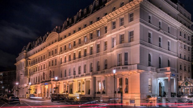 A large, historic building with multiple stories, featuring classic architectural details and a prominent entrance. - Hyde & Seek, London Hyde Park, a Tribute Portfolio Hotel (London)