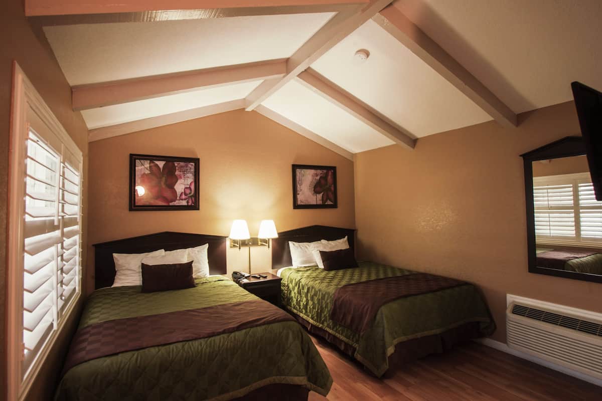 Premium bedding, blackout curtains, iron/ironing board, free WiFi