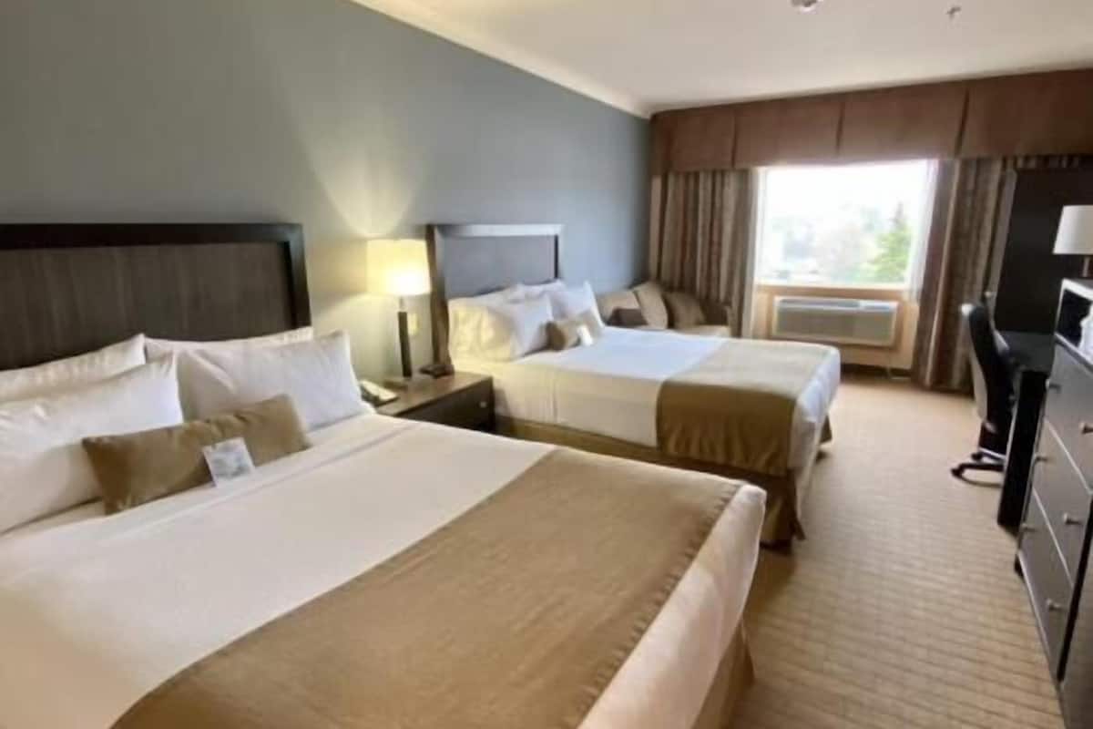 Premium bedding, pillowtop beds, in-room safe, blackout drapes