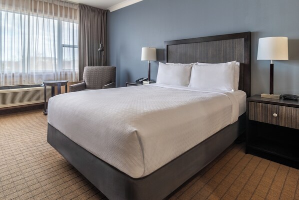 Premium bedding, pillow-top beds, in-room safe, blackout curtains