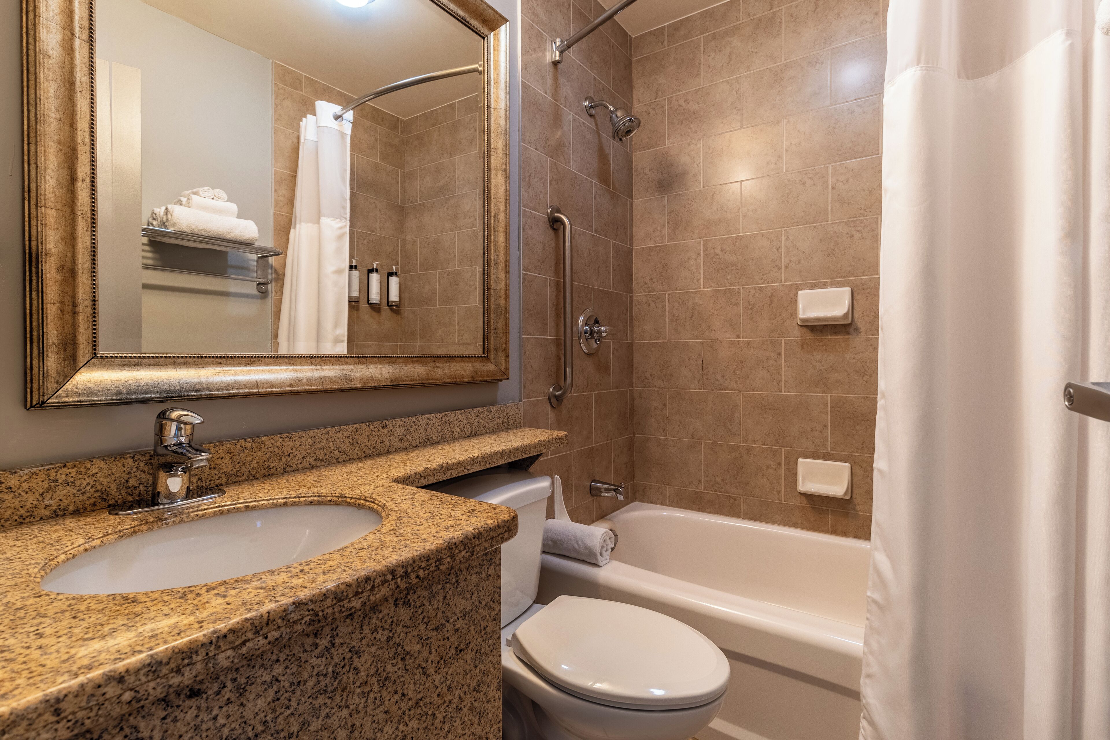 2 queen beds with full bathroom | bathroom | combined shower/bathtub, free toiletries, hair dryer, towels