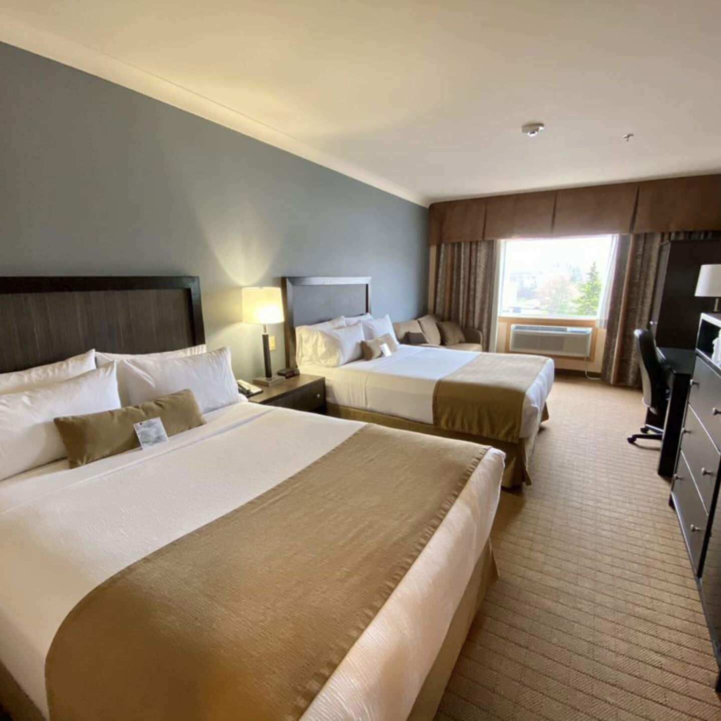 Premium bedding, pillow-top beds, in-room safe, blackout curtains