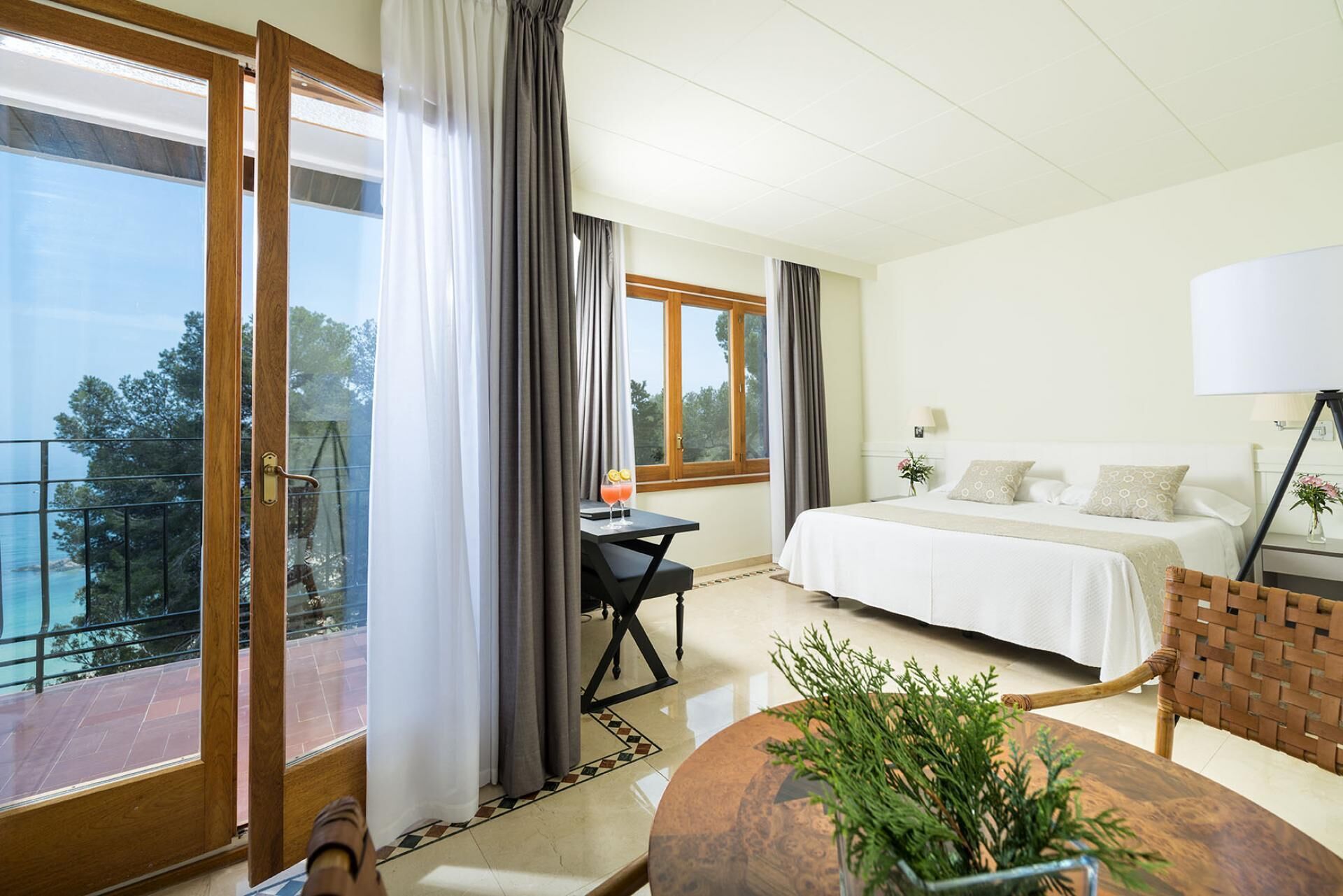 family room, balcony, sea view | 1 bedroom, premium bedding, minibar, in-room safe