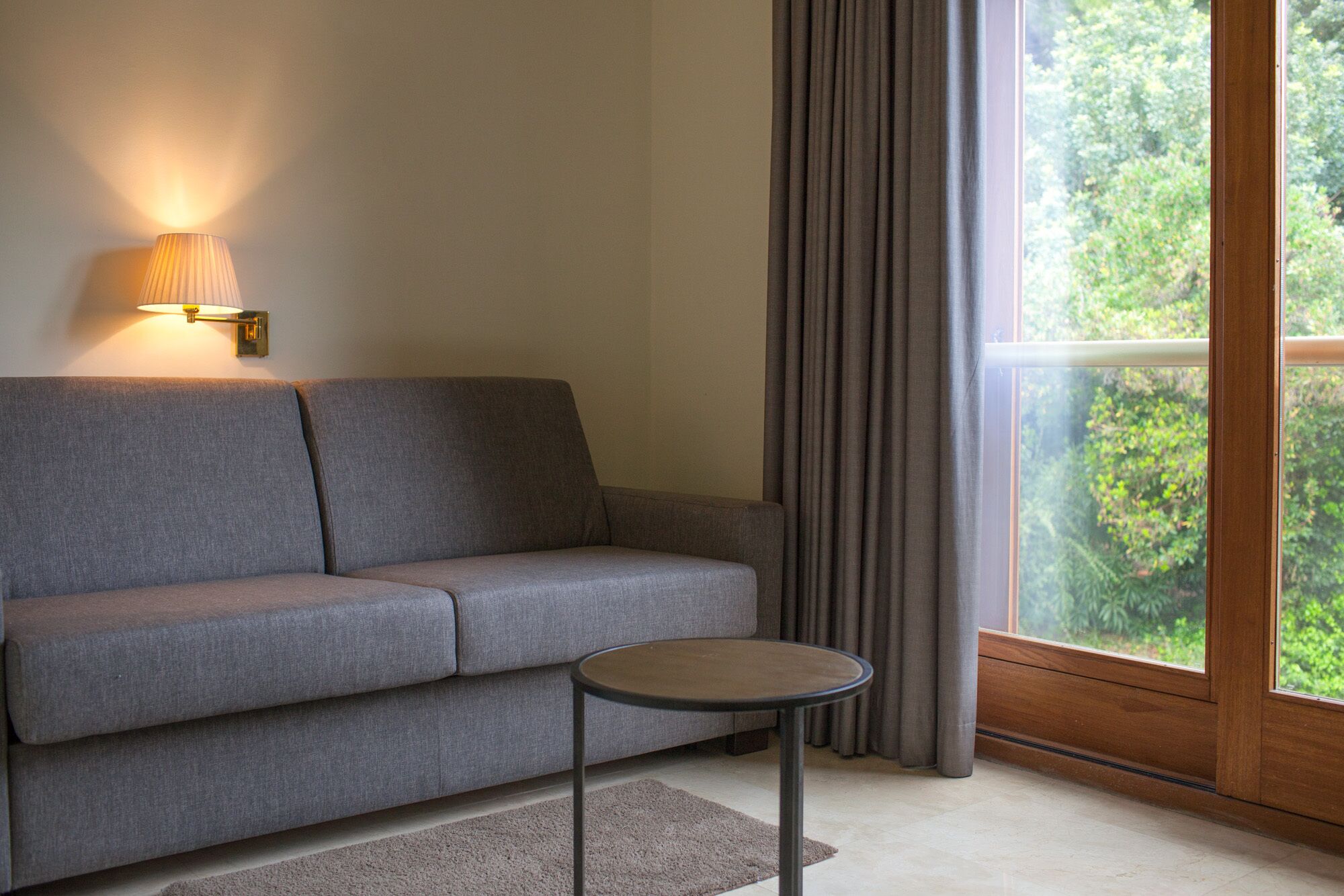 family room, balcony, garden view | 1 bedroom, premium bedding, minibar, in-room safe