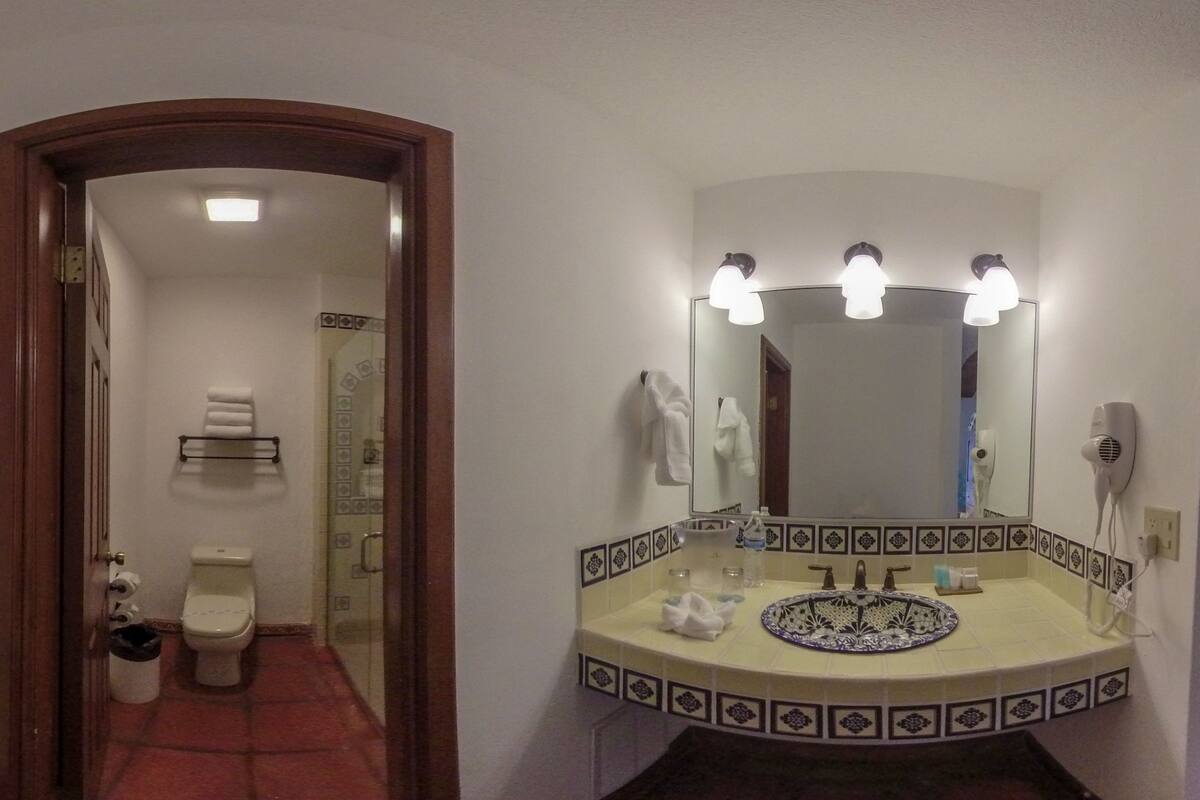 junior suite | bathroom | shower, rainfall showerhead, free toiletries, hair dryer