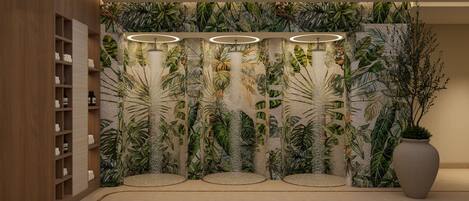 A room with a tropical-themed wall mural, a wooden shelving unit, and a large vase.
