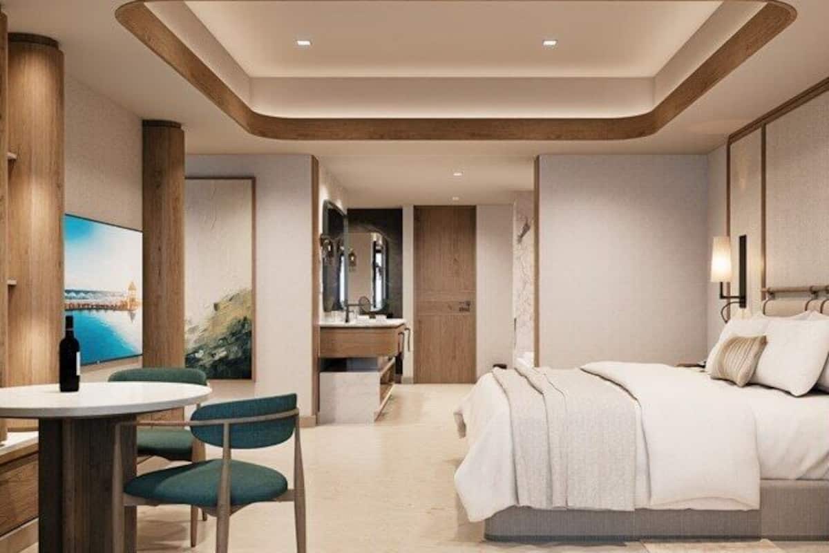 Premium bedding, down comforters, free minibar, in-room safe
