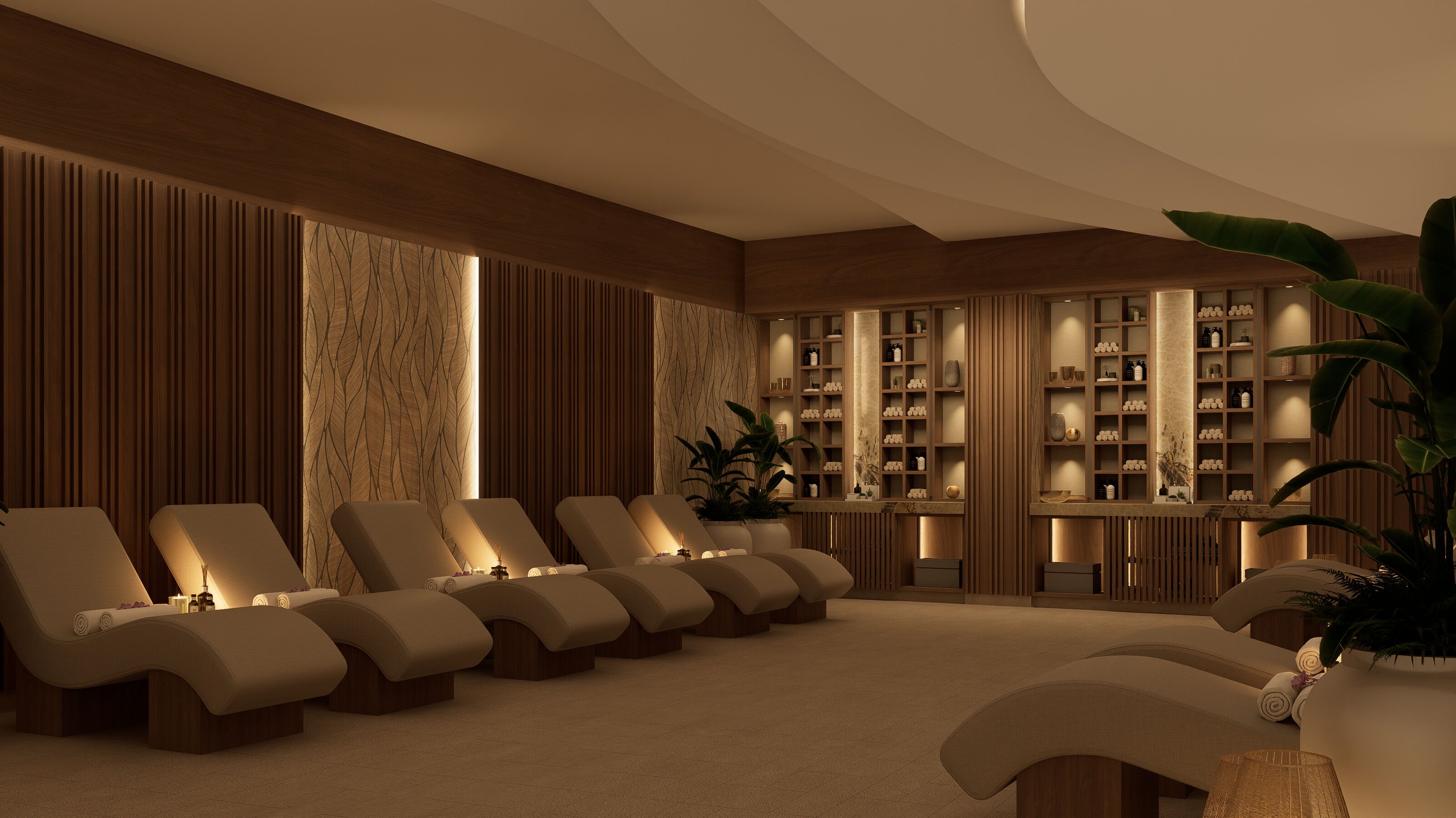 A modern lounge area with reclining chairs, a central plant, and a shelving unit with various items.