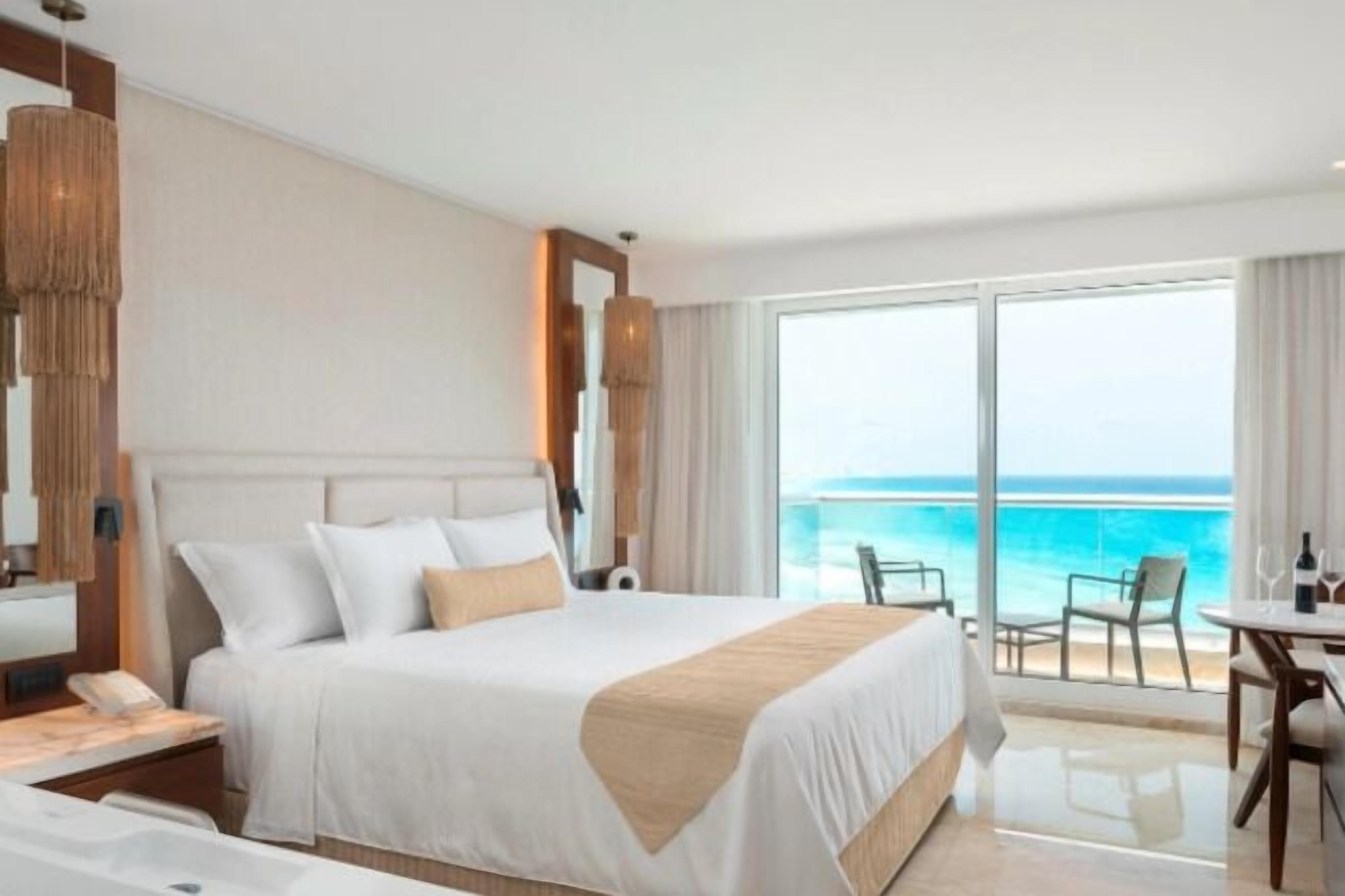 Hypo-allergenic bedding, down comforters, free minibar, in-room safe