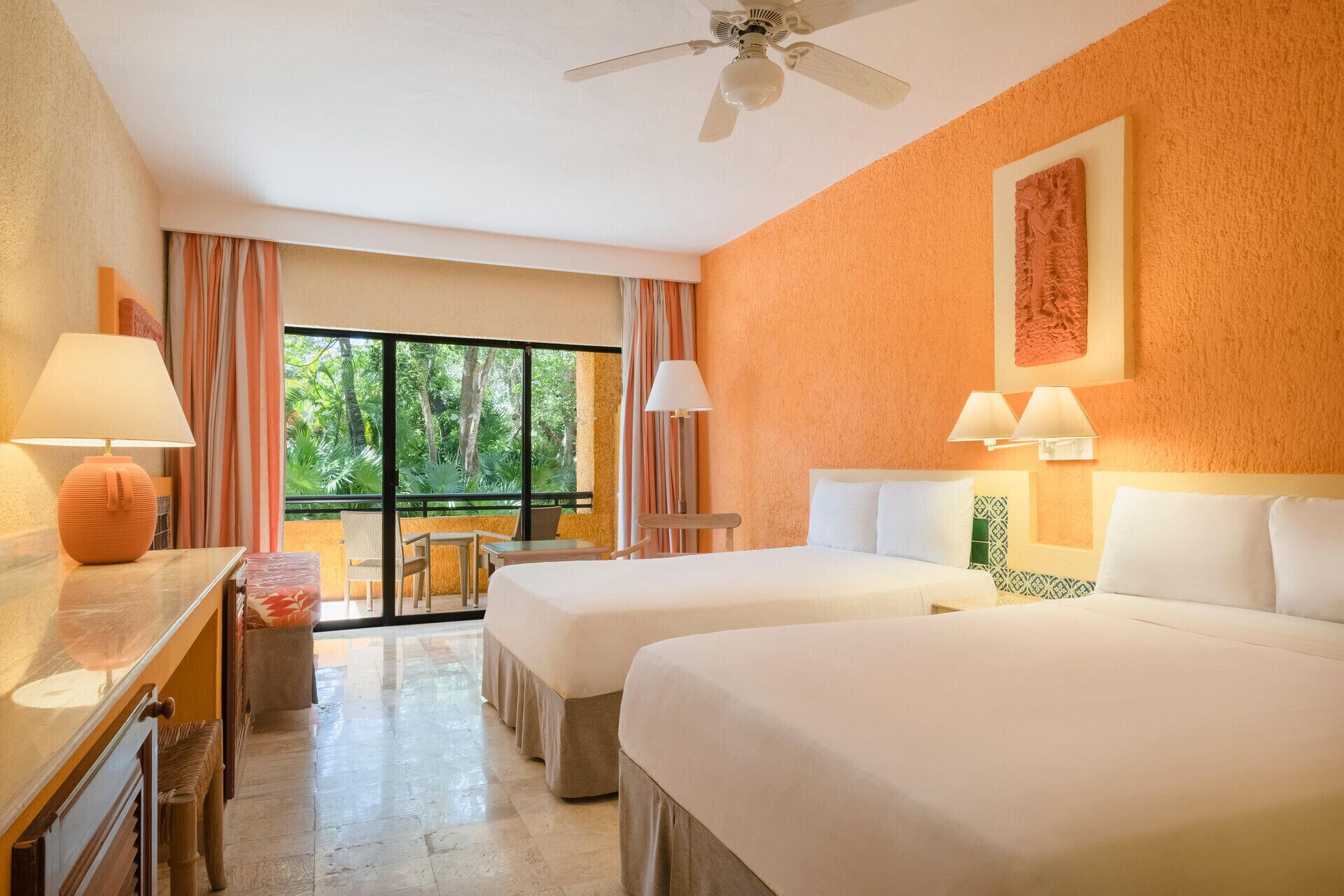 Premium bedding, down comforters, free minibar, in-room safe