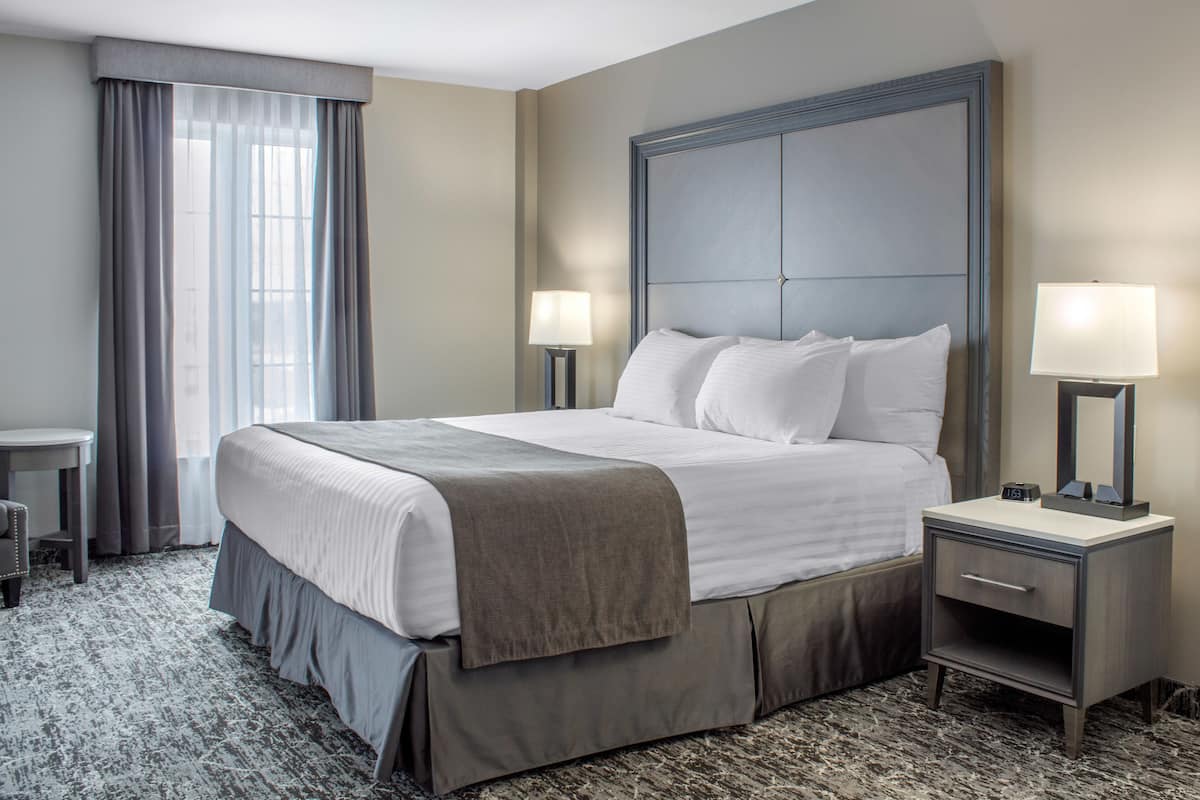 desk, laptop workspace, blackout curtains, iron/ironing board