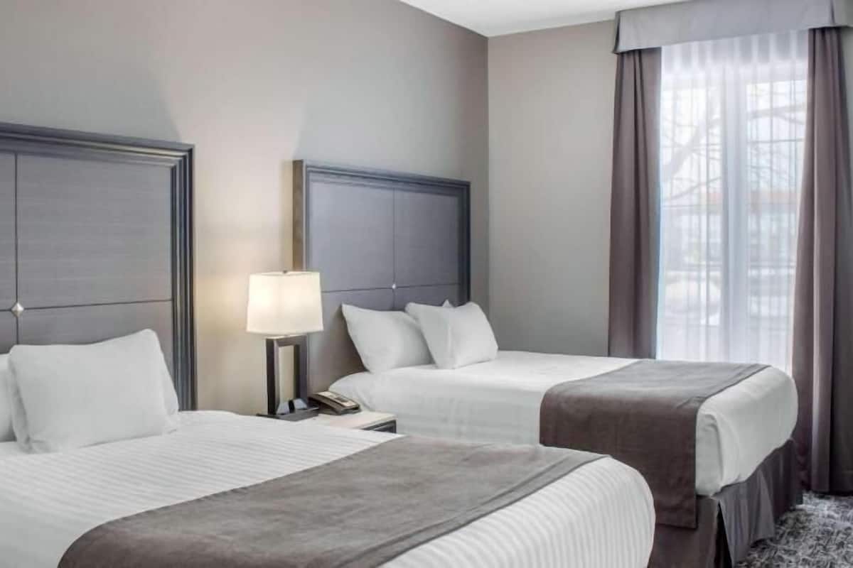 Desk, laptop workspace, blackout curtains, iron/ironing board