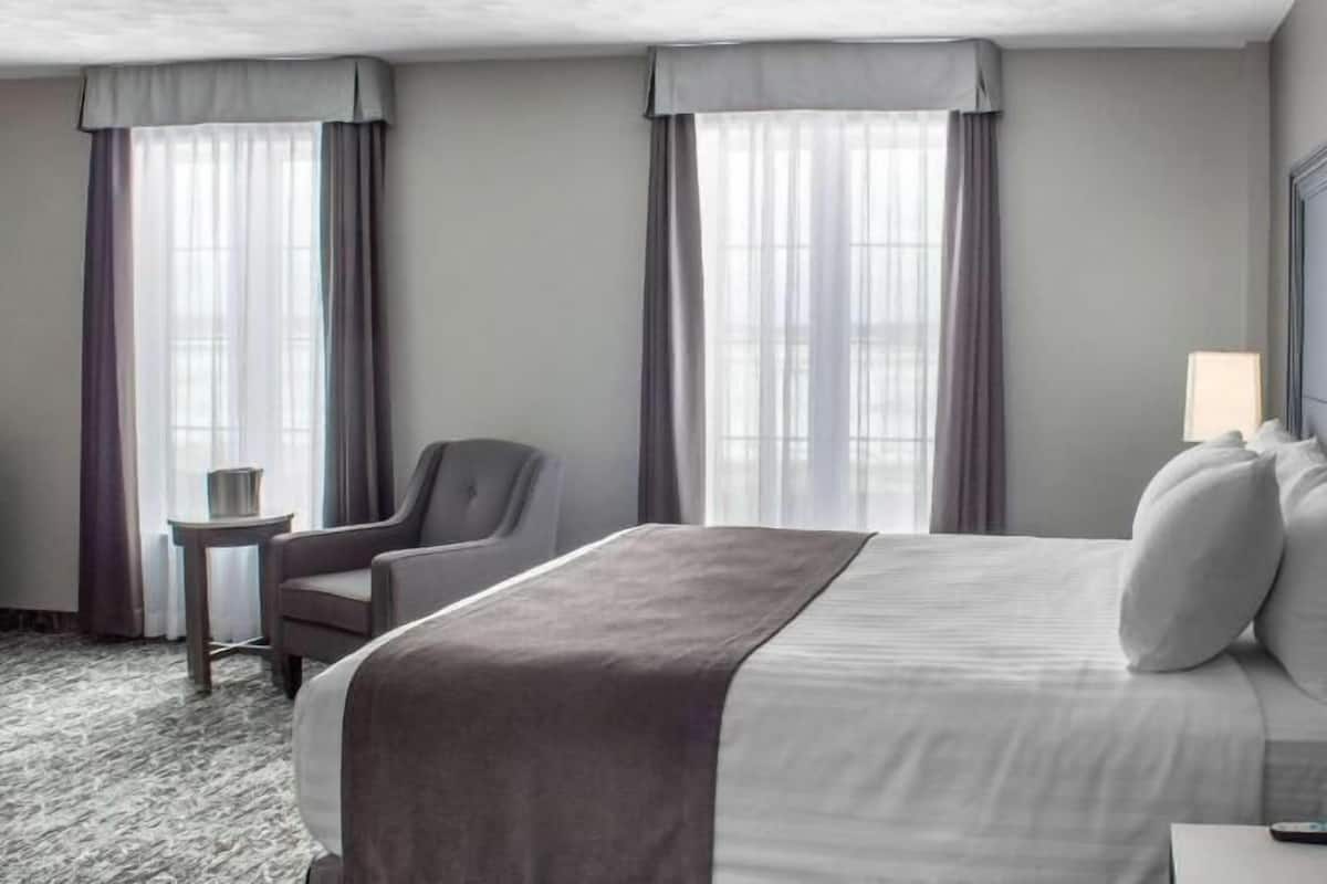 Desk, laptop workspace, blackout curtains, iron/ironing board