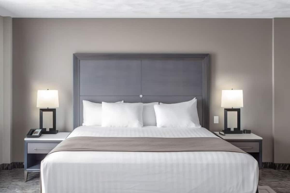 Desk, laptop workspace, blackout curtains, iron/ironing board