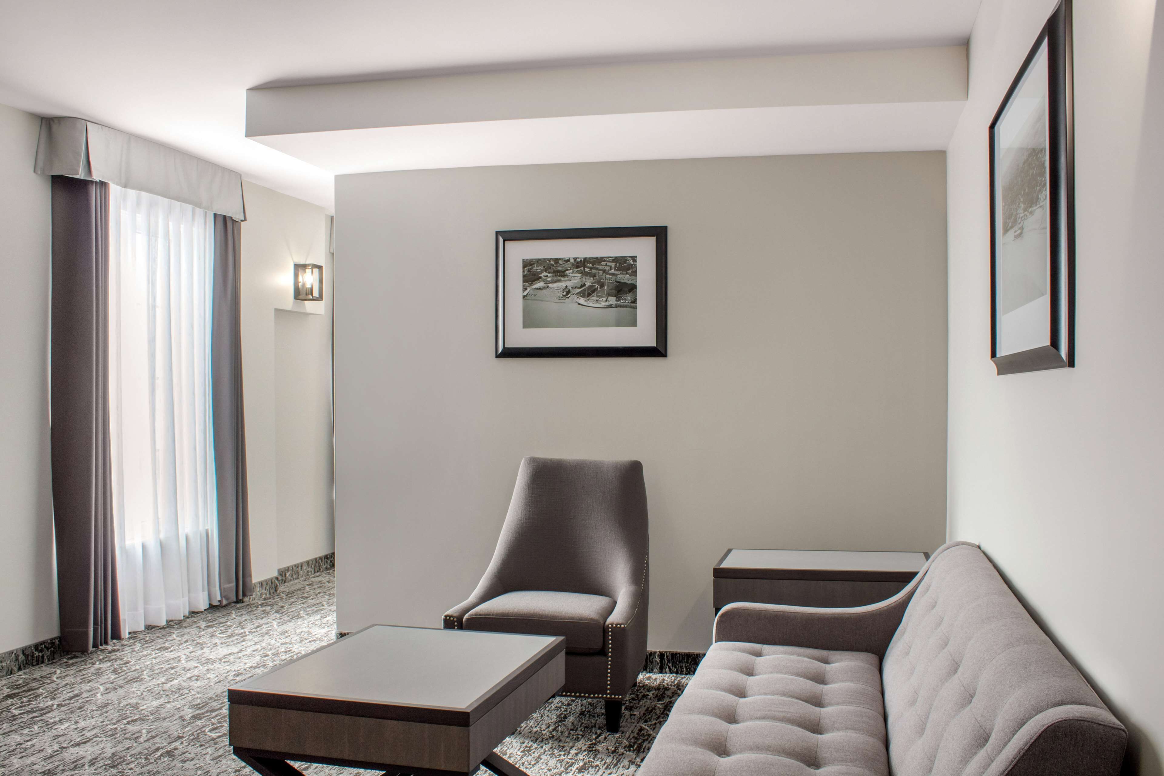 suite, 1 king bed, non smoking, river view (monarch) | desk, laptop workspace, blackout curtains, iron/ironing board