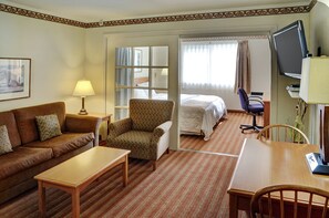 Superior Suite, 1 Bedroom | Living room | 55-inch flat-screen TV with cable channels
