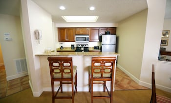 Fridge, microwave, oven, stovetop at Hilton Vacation Club Grande Villas Orlando