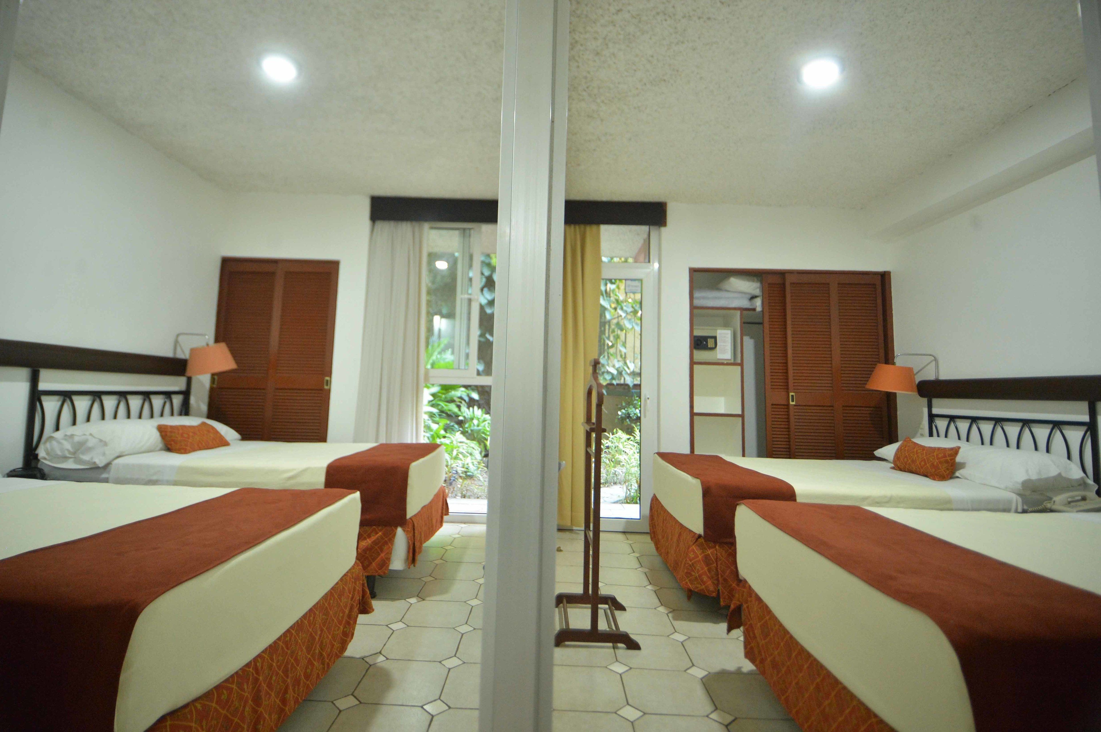 Family Room | Premium bedding, in-room safe, desk, laptop workspace