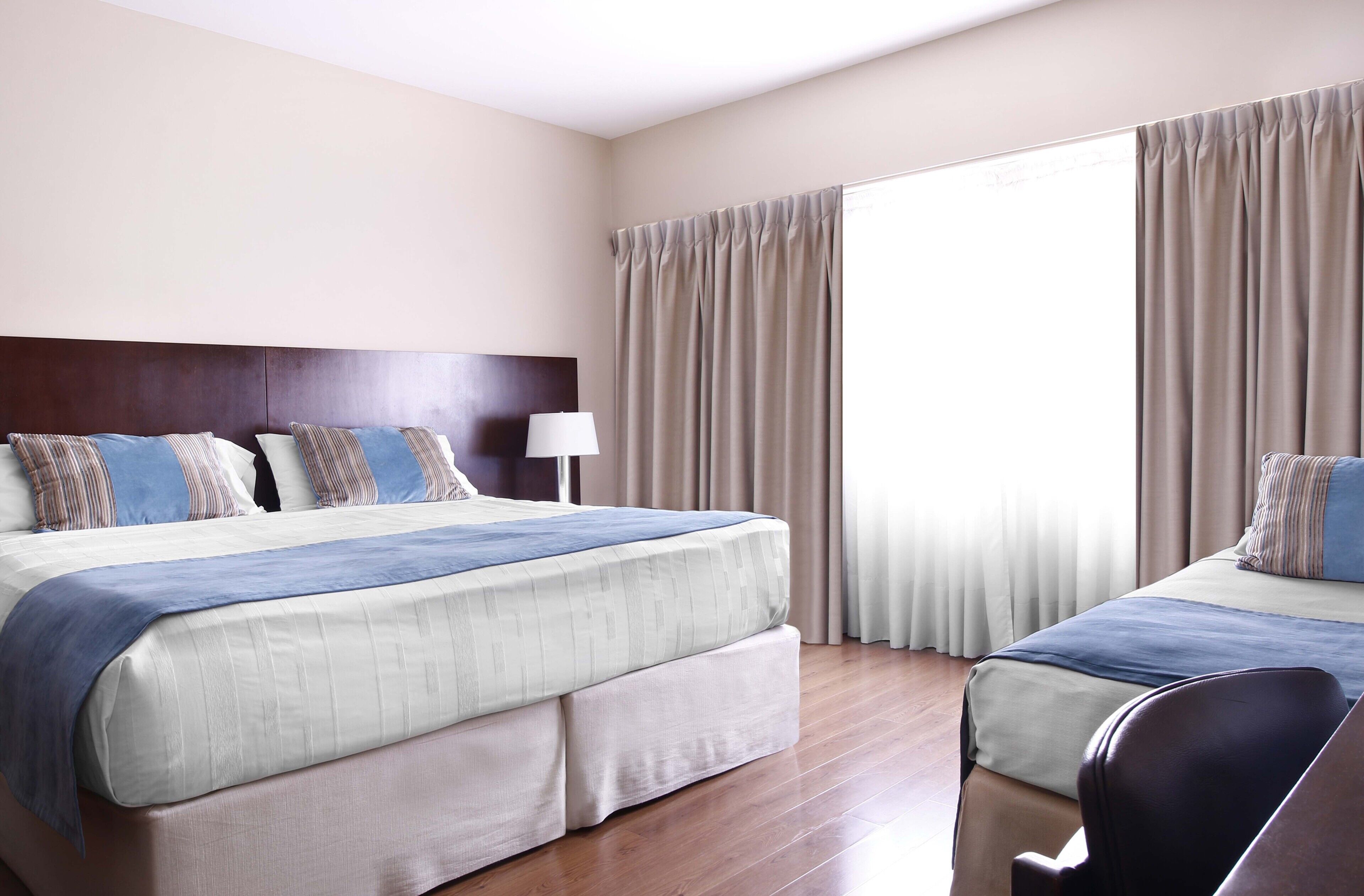 standard triple room | premium bedding, down duvets, pillow-top beds, in-room safe